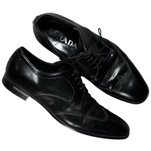 Prada Metal Logo Heel Derbies