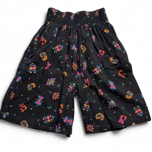 Craig Clothing Co. vintage 80’s/90’s high waisted baggy black cotton rayon shorts with multicolored geometric and abstract shapes, size “petite” (XS-S). Measurements: very stretchy range of 27-30” waist, very baggy hip (up to 38”), 19” length, and 14” rise. Would be perfect for an 80’s or 90’s Halloween costume! #geometric #abstract #vintage #90s #80s 

0318