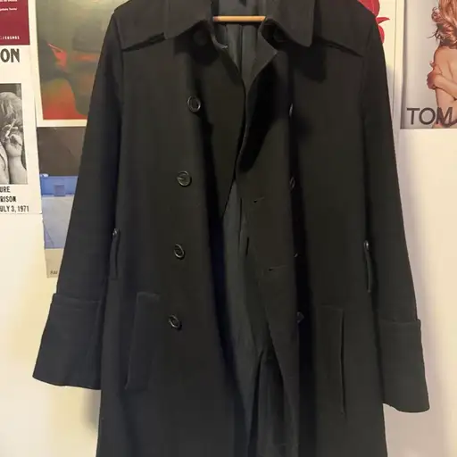Dior homme Aw08 peacoat

Iconic first look peacoat from Kris Van Assche's debut at Dior Homme, replacing Hedi Slimane.
Size 48 (slim M)
This collection is highly sought after with many iconic pieces featuring his trademark tailoring and panelling.
Belt is busted but included,
Condition leaves a little to be desired but considering the age and wear these are purely cosmetic and doesn't affect the experience. One pocket flap has slightly come undone
Small moth holes and distressing along sleeve and near the bottom of the front of the torso.
A collectors piece.