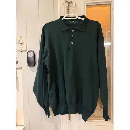 Embassy Row Mens Pure New Wool Polo Sweater Green Made in Italy L

Embassy Row long sleeve polo sweater crafted in Italy from premium pure new wool. This sophisticated hunter green piece features a classic three-button placket, a structured collar, and ribbed cuffs and hem for a refined fit. The lightweight yet warm knit construction makes it an ideal layering piece for transitional weather or a polished standalone top for business casual attire. Quality Italian craftsmanship is evident in the smooth texture and rich color depth of this timeless wardrobe staple.

#BusinessCasual #Fall #Casual