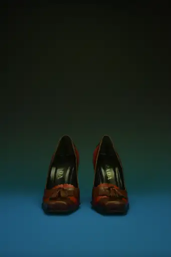 Prada Brogue Tassel Heels