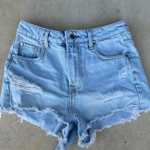 Loro Piana light blue denim shorts with distressed details #luxury #designer