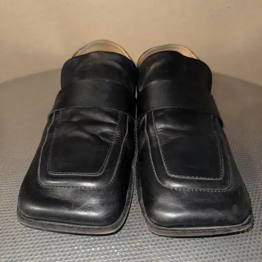 Marsell black Spatola loafers.  Men’s size IT 46, US 13. In good, used condition. Buffed calfskin loafers. Square moc toe. Concealed elasticized strap at tongue sides. Tonal leather sole with rubber injection at heel. Made in Italy.