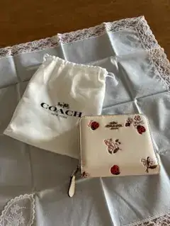 [美品]COACH 二つ折り財布 てんとう虫 花柄 ホワイト