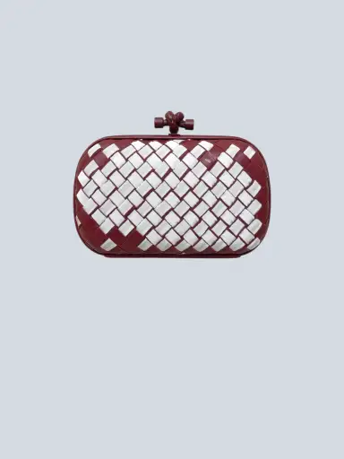 Bottega Veneta
 Knot clutch in leather and woven fabric.