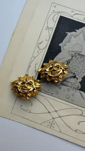 Hermès vintage sun motif clip-on earrings