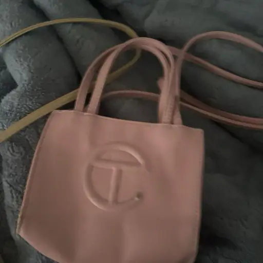 Pink mini Telfar bag with logo #mini