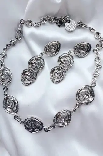 authentic Yves Saint Laurent swirly necklace & earrings set