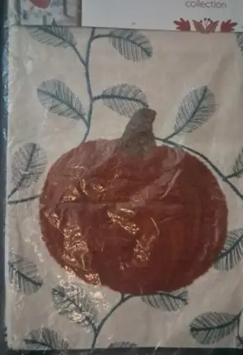 Cute pumpkin table runner. New. In package