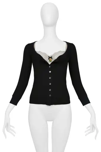 DOLCE & GABBANA BLACK TOP WITH ATTACHED OFF WHITE LACE INSET AND ENAMEL PENDANT