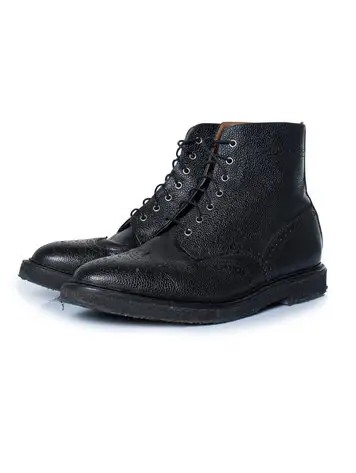 Thom Browne, pebble gain wingtip boots in black