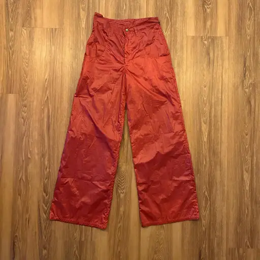 Barragán red nylon pants. Wide leg fit with interesting waist detail.

Tag says 30 but fits closer to a US 28.