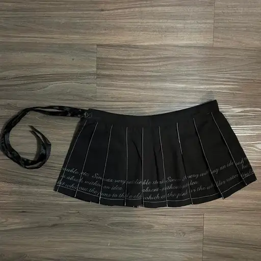 h.naoto blood pleated wrap skirt 
has ribbon tie 
beautiful scripture all around 
rare and beautiful 

#hnaoto #vkei #gothiclolita #japanesearchive