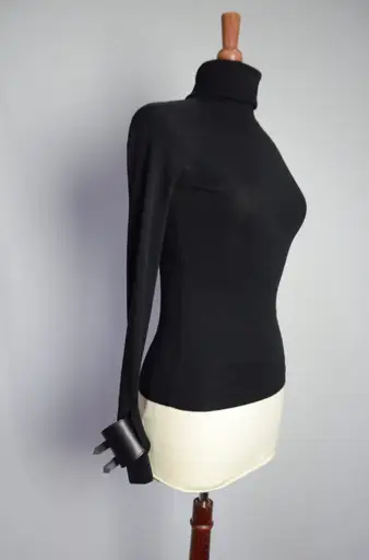 Alexander McQueen polo neck with buckled cuffs
