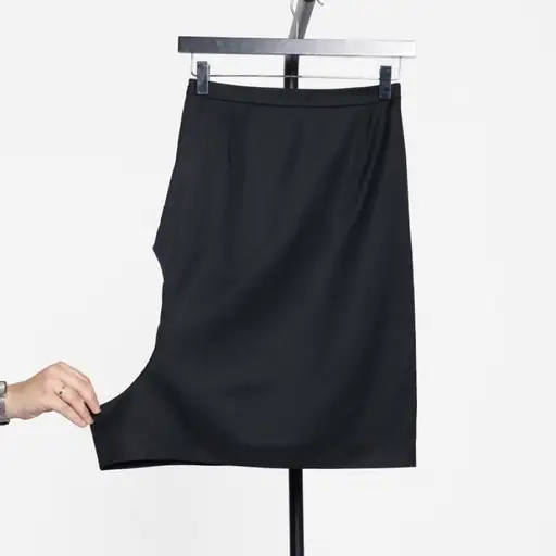 RARE JURGI PERSOONS BLACK HOLE SKIRT WITH A FITTED, STRAIGHT SILHOUETTE. FEATURES A HIGH-RISE WAISTBAND AND DISTINCTIVE OVERSIZED CURVED CUT-OUT THROUGH THE LEFT HIP AND SIDE, CREATING AN EXPOSED SECTION OF THE LEG. OVERALL A CLEAN, MINIMAL CONSTRUCTION AND MINI-LENGTH HEM .

SIZE MARKED: 36

MEASUREMENTS:

WAIST : 32CM

HIPS : 40CM

LENGTH : 57CM

ALL MEASUREMENTS ARE TAKEN LAID FLAT.

COMPOSITION:

100% MERINO WOOL

#jurgi #persoons #archive #hole #skirt