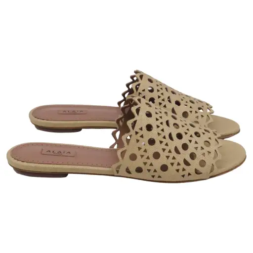 Alaïa Laser-cut Flat Sandals in Khaki Leather